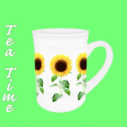 a white mug with sunflowers on it and the words tea time