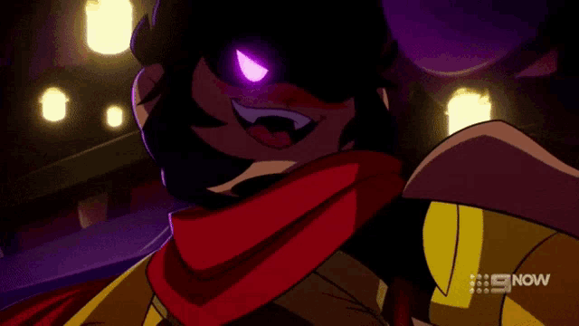 a cartoon character with purple eyes and a scarf around his neck says now on the bottom right corner