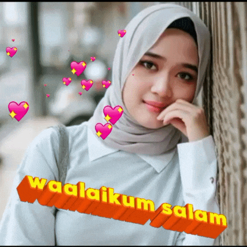 a woman wearing a hijab is leaning against a wall with hearts and the words waalaikum salam