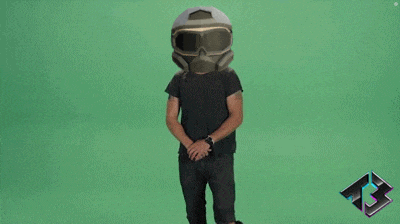 a man wearing a gas mask and goggles stands in front of the words do it