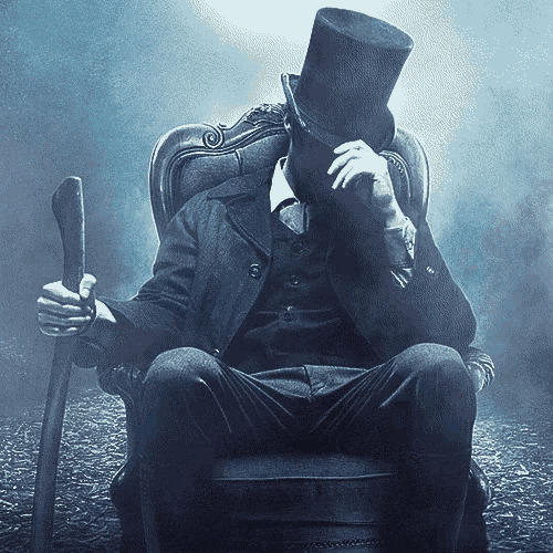 a man wearing a top hat and holding a cane is sitting in a chair