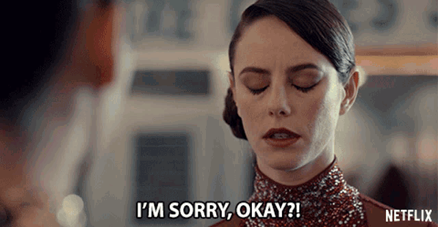 a woman says i 'm sorry okay on a netflix ad