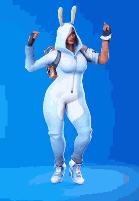 a woman in a blue bunny suit is dancing