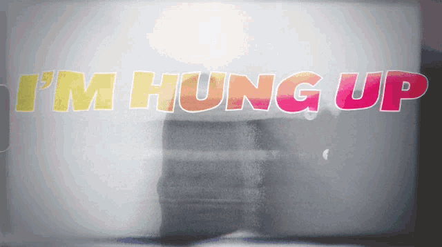 a sign that says i 'm hung up in yellow and pink letters
