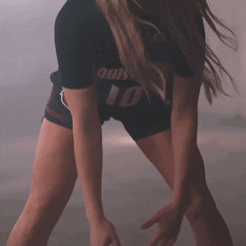a woman wearing a black shirt with the number 10