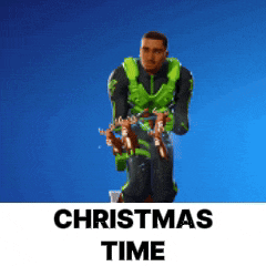 a man in a green suit is holding two reindeer .