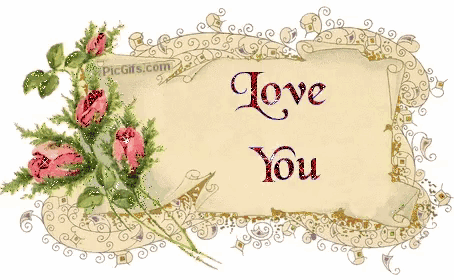 a picture of roses and a sign that says i love you