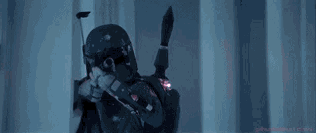 a person is shooting a laser beam at another person .