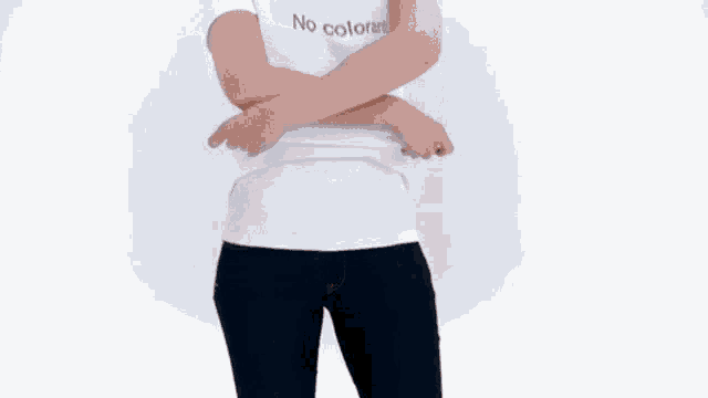 a woman is wearing a white t-shirt that says no coloring