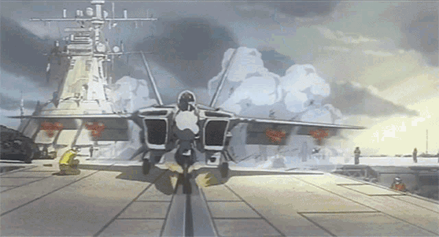 a jet is taking off from the deck of a military ship