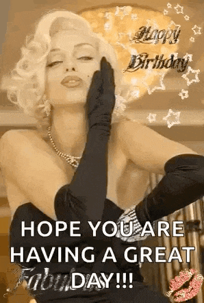 a woman in a black dress and black gloves is blowing a kiss and wishing you a great birthday .