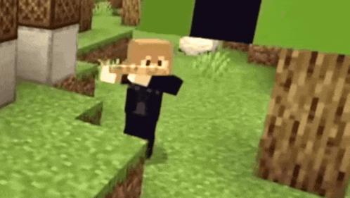 a person in a black suit is playing a video game in a field .