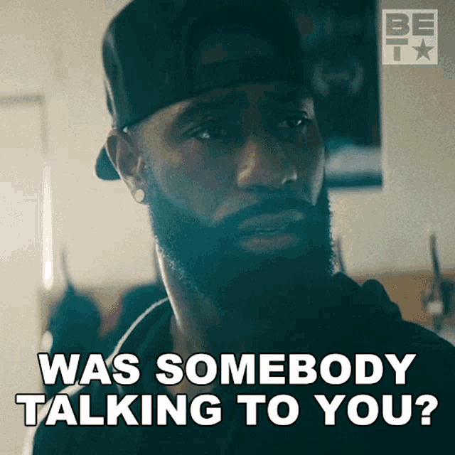 a man with a beard is asking if somebody was talking to you