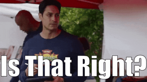a man in a firefighter shirt is holding a tablet and says is that right ?