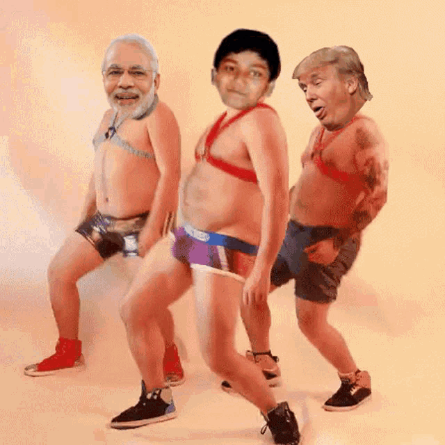 three men are dancing with their faces on them