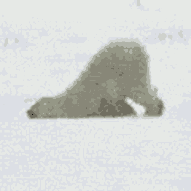 a gray object with a white background is floating in the air