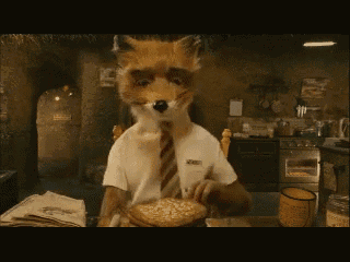 a fox wearing a white shirt and tie is holding a pie
