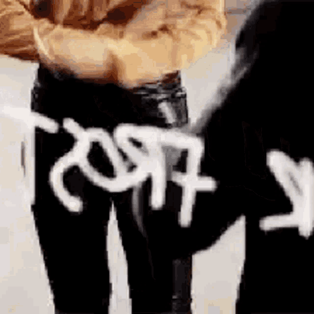 a close up of a person 's pants with the word toast written on it .