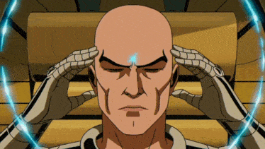 a bald man is holding his head in pain