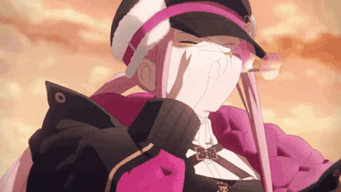 a girl in a pink jacket and hat is covering her face with her hand