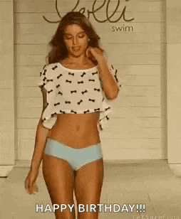 a woman is dancing in a room with the words `` happy birthday '' written on the bottom .
