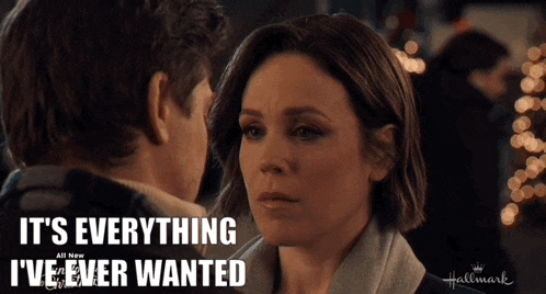 a hallmark ad shows a man and a woman looking into each other 's eyes
