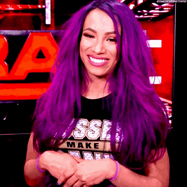 a woman with purple hair is wearing a tshirt that says ssf make
