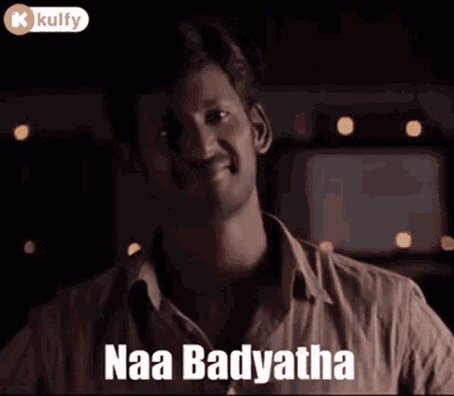 a man is smiling and says naa badyatha .