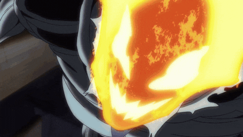 a close up of a person 's face with a flame coming out of it