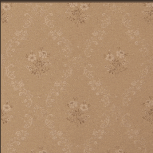 a brown background with white flowers on it