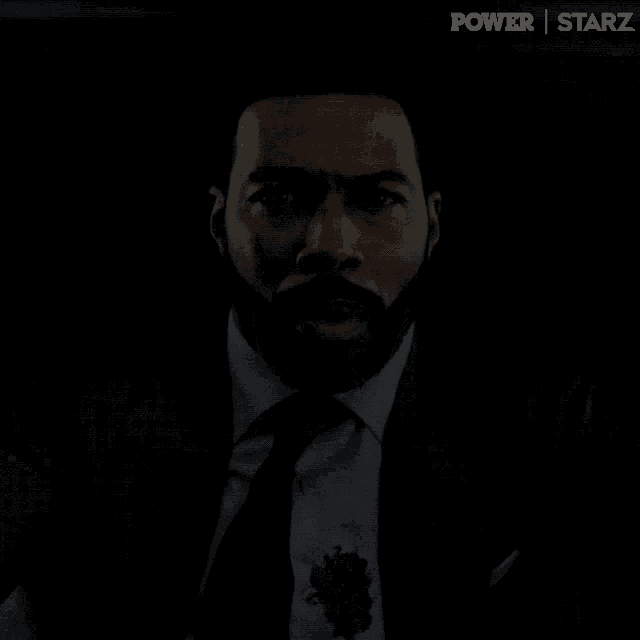 a man in a suit and tie with blood on his shirt is featured in a power starz ad