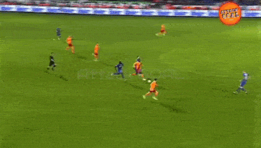 a soccer game is being played on a field with the words attack goal on the bottom