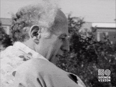 a black and white photo of a man with the words sound & vision below