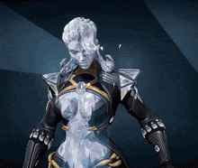a statue of a woman in a black and gold outfit is standing in front of a blue background