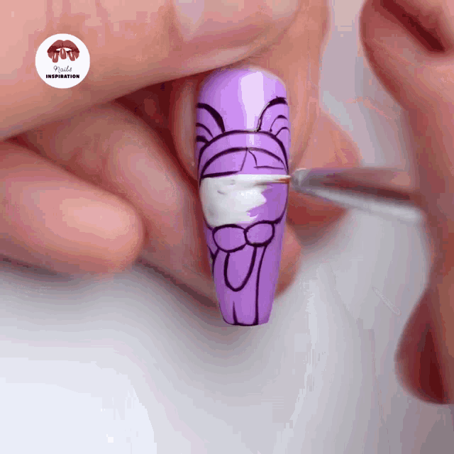 a close up of a person 's nails with the words nails inspiration on the bottom right