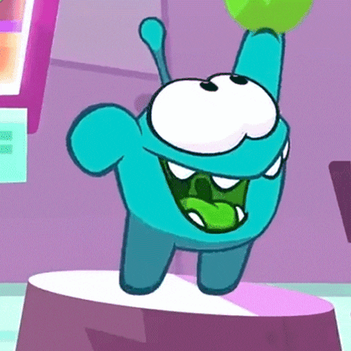 a blue cartoon character is holding a green object in his hand