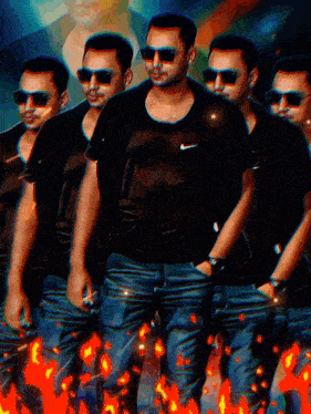 a man wearing sunglasses and a nike shirt is surrounded by other men