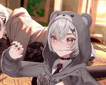 a girl wearing a teddy bear hooded jacket with the word slayer on the front