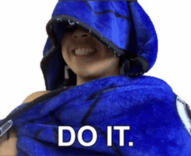 a person wrapped in a blue towel with the words do it below them