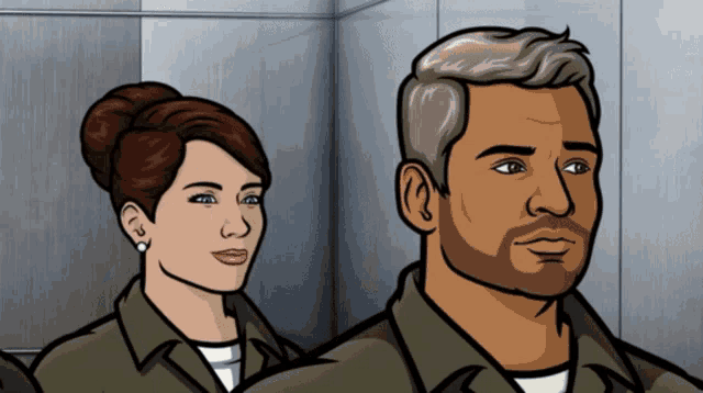 a man and a woman are standing next to each other in a room