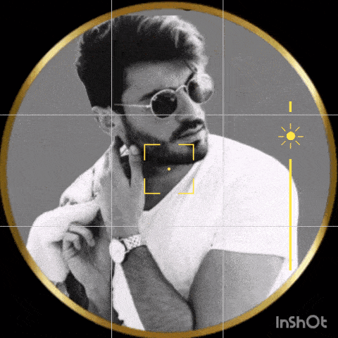 a man wearing sunglasses and a watch is being photographed in a circle with the word inshot at the bottom