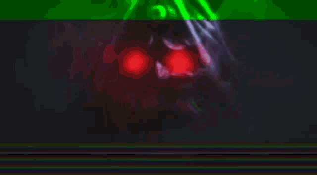 a close up of a monster 's face with red eyes .