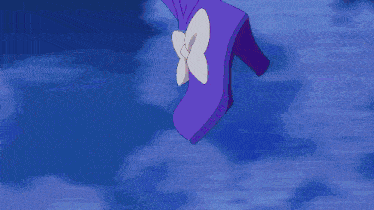 a close up of a person 's legs with purple socks