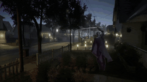a man in a black coat is standing in front of a purple light