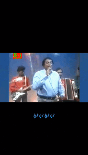 a man singing into a microphone with a rpj logo on the bottom