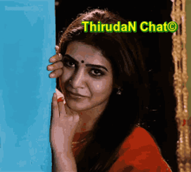 a woman peeking out from behind a blue wall with the words thirudan chat written on the bottom