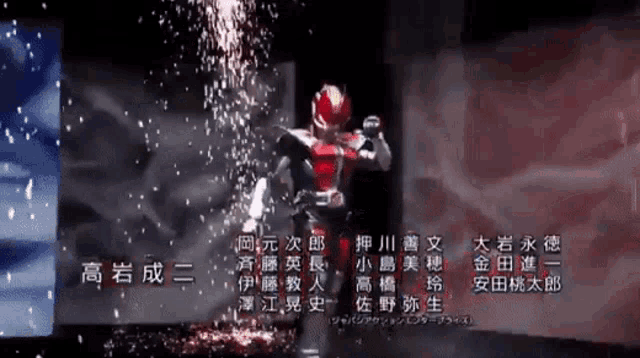 a man in a red and black superhero costume with chinese writing