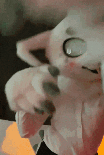 a close up of a stuffed animal that looks like a cartoon character