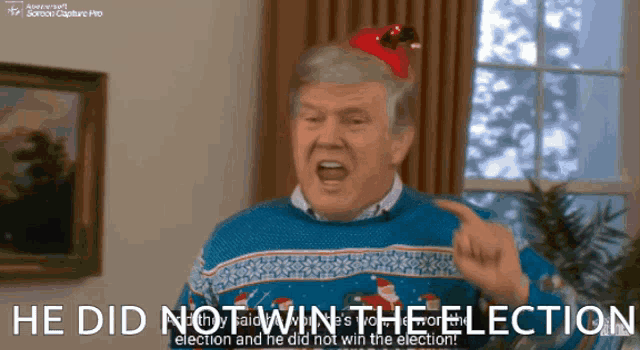 a man wearing a santa hat says he did not win