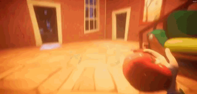 a person is playing a video game in a room with a staircase and a door .